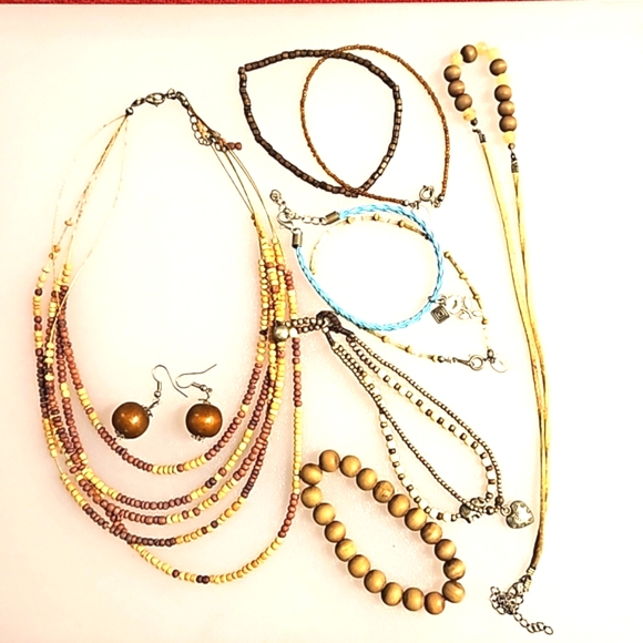Various Jewelry - Lot of 9 pc. of 2 necklaces 1 earring 6 bracelets bag #1 faux wood tan natural